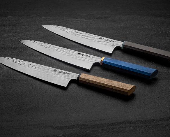 215mm Gyuto. Hammered San Mai 440C Stainless. Blue Pakka / Ebony / Oak